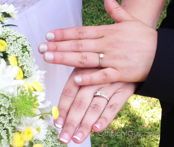 a photo of wedding rings after a lesbian wedding, this officiant performs gay weddings